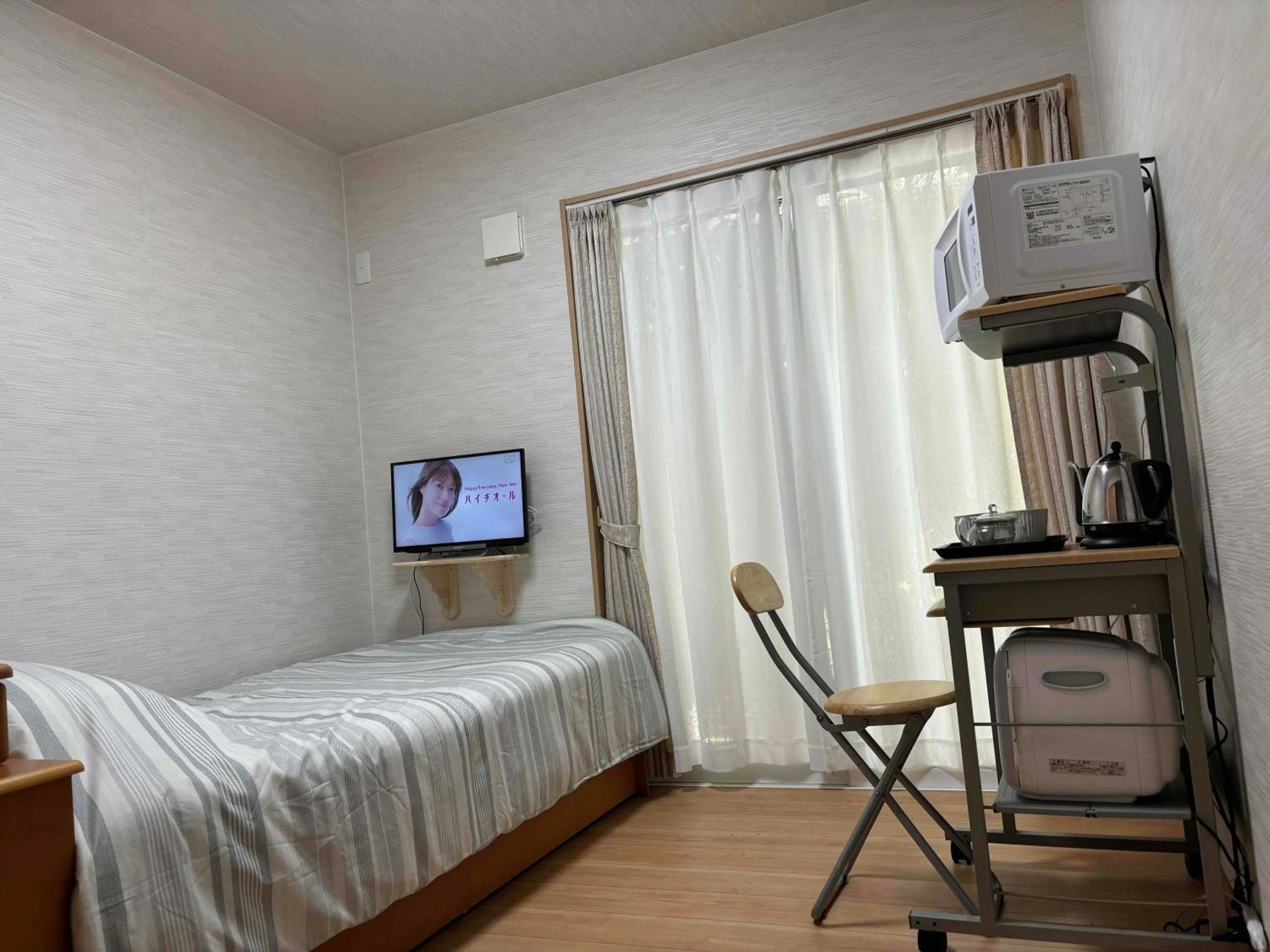 Guest House Harukawa Осака Экстерьер фото
